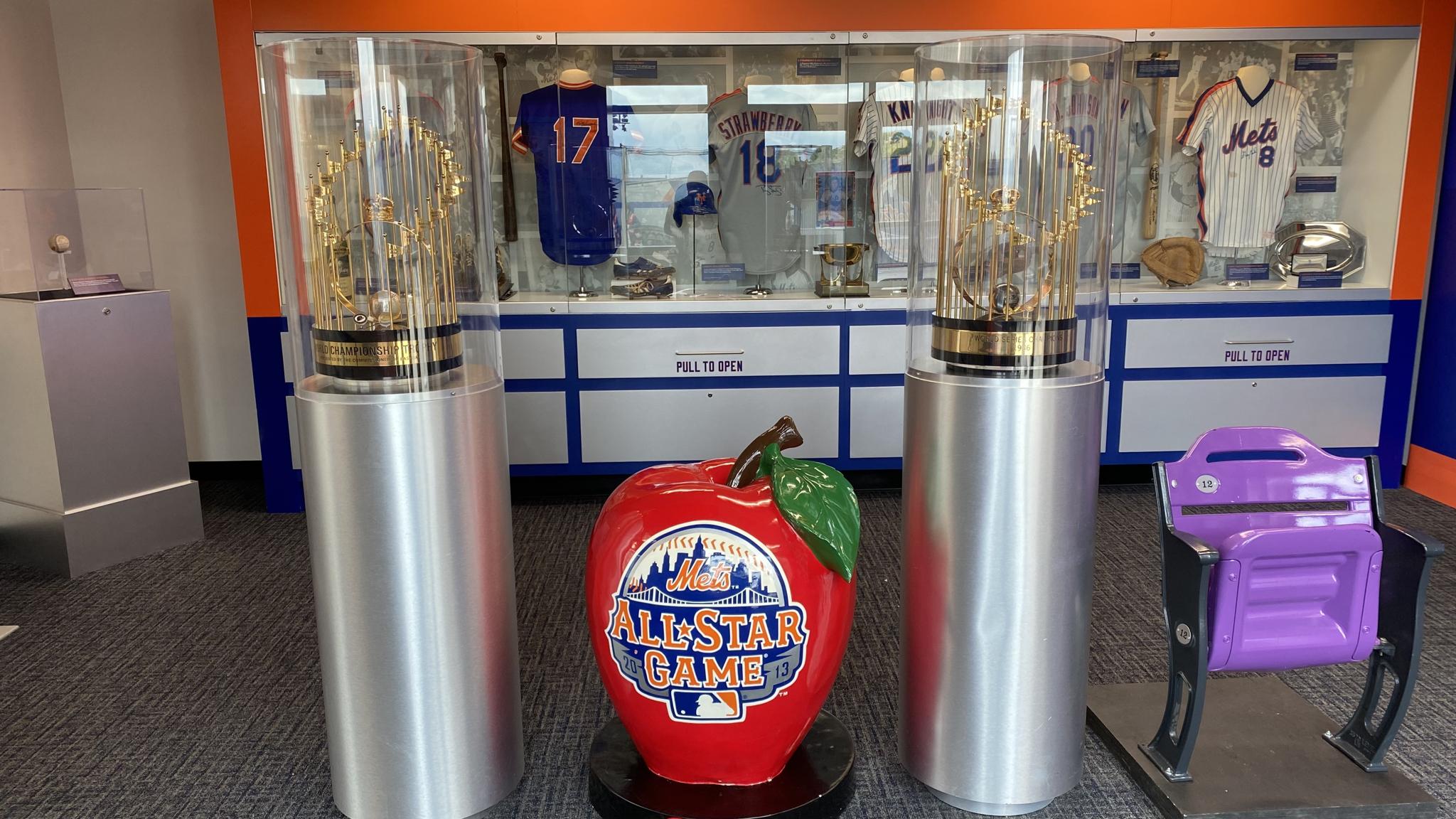 A photo of two World Series trophies on display