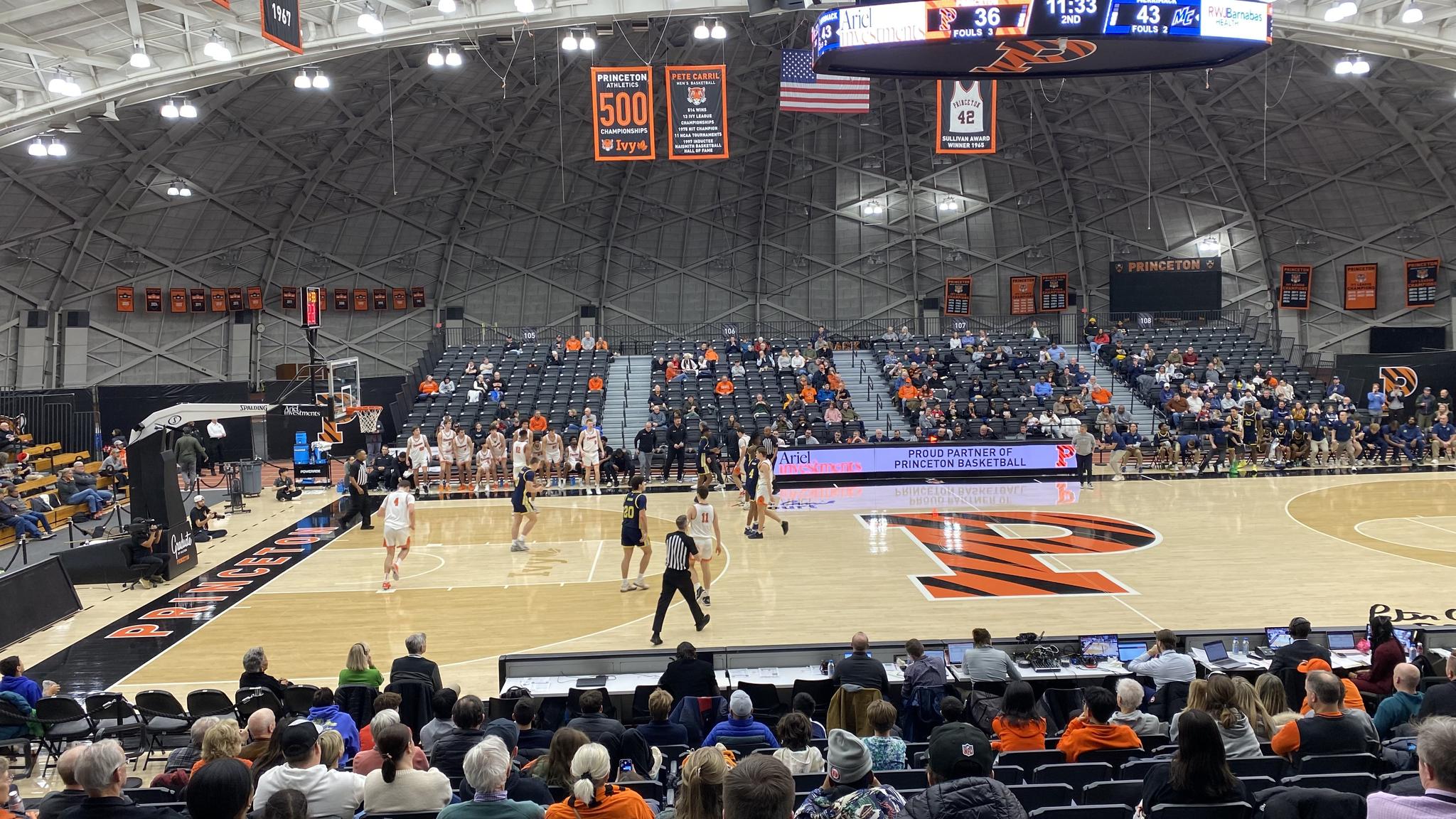 A photo of game action taken from the first row of the upper seating area at Jadwin Gymnasiumm