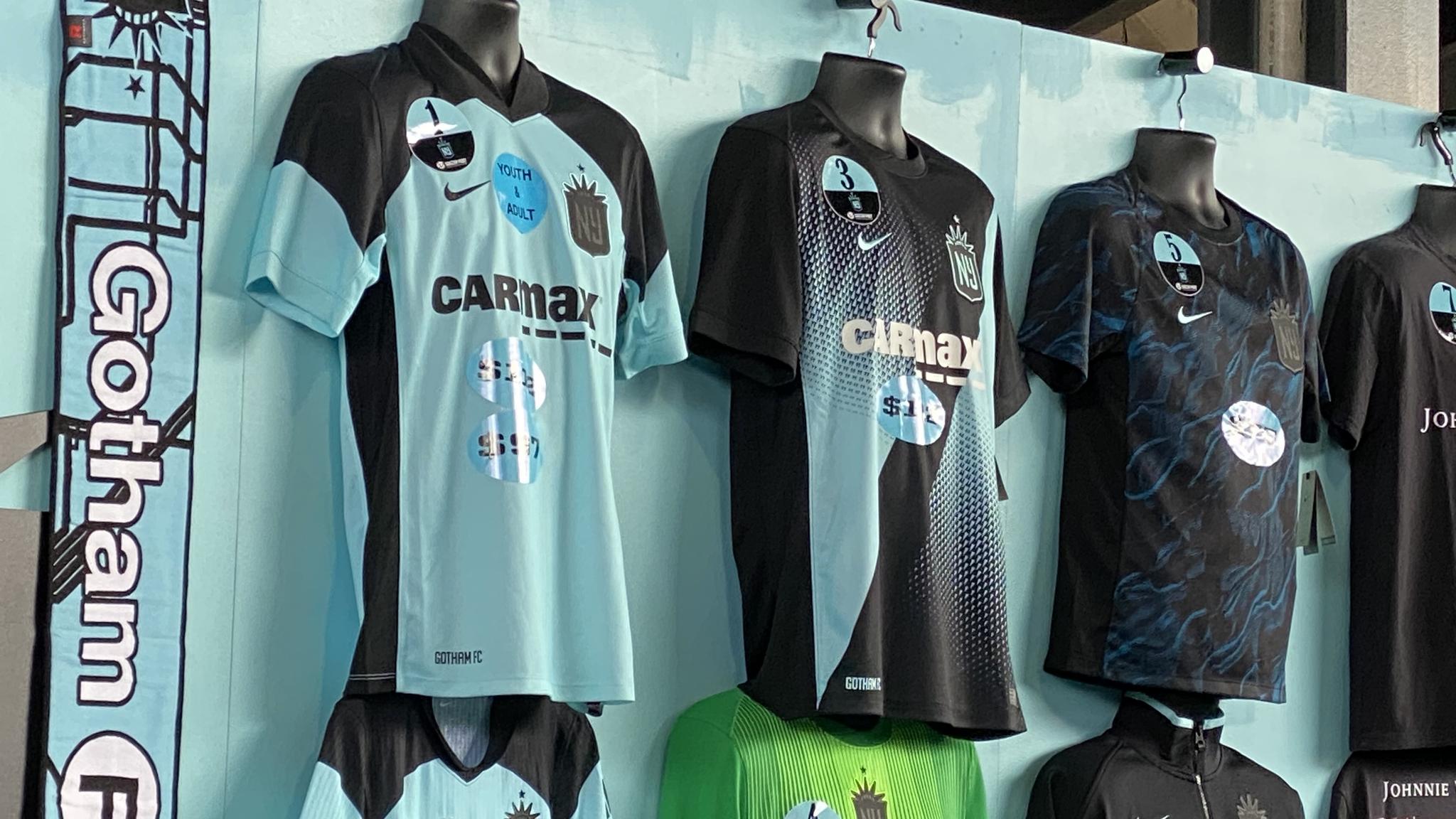 A photo of Gotham FC jerseys (from left to right: away, home, practice)